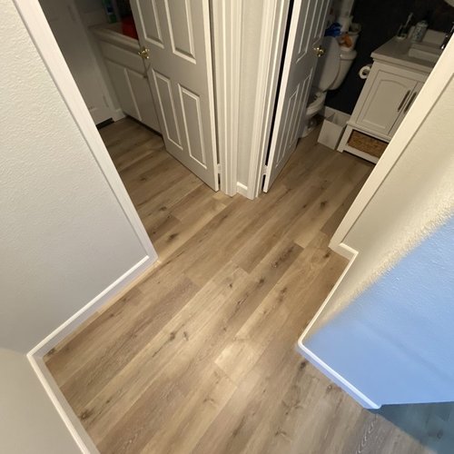 hallway with hardwood flooring