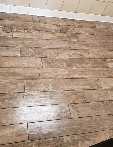 empty room with hardwood flooring