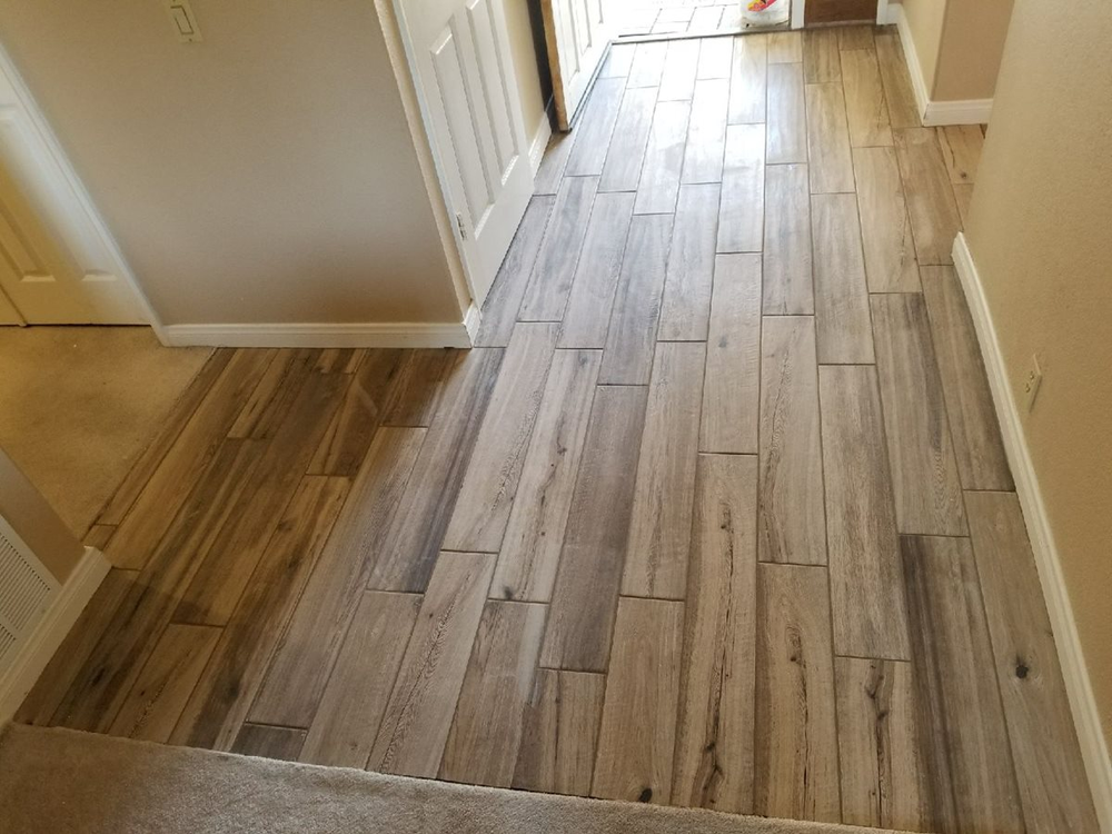 hallway with hardwood flooring