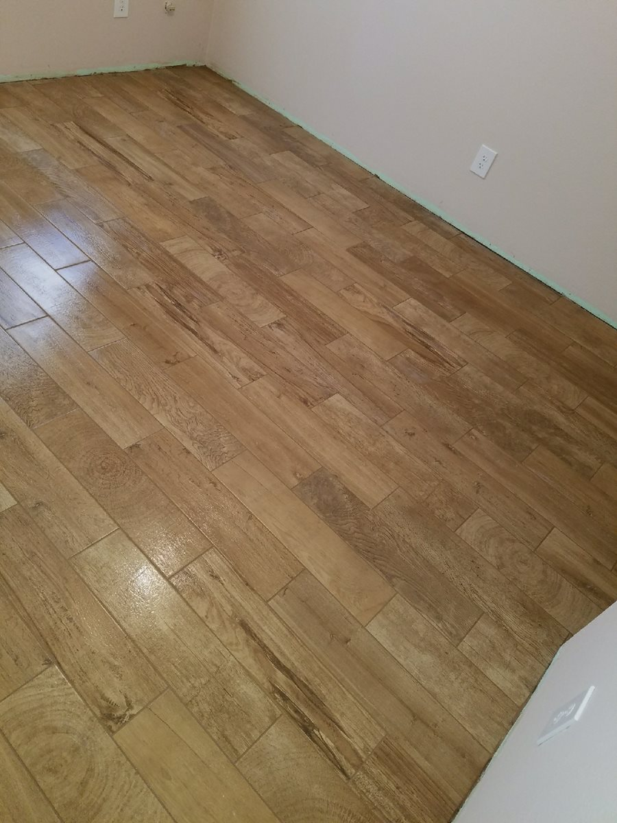 empty room with hardwood flooring