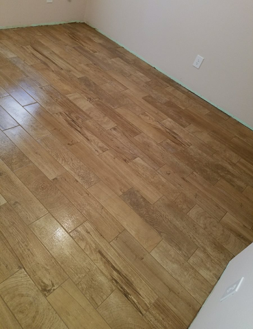 empty room with hardwood flooring