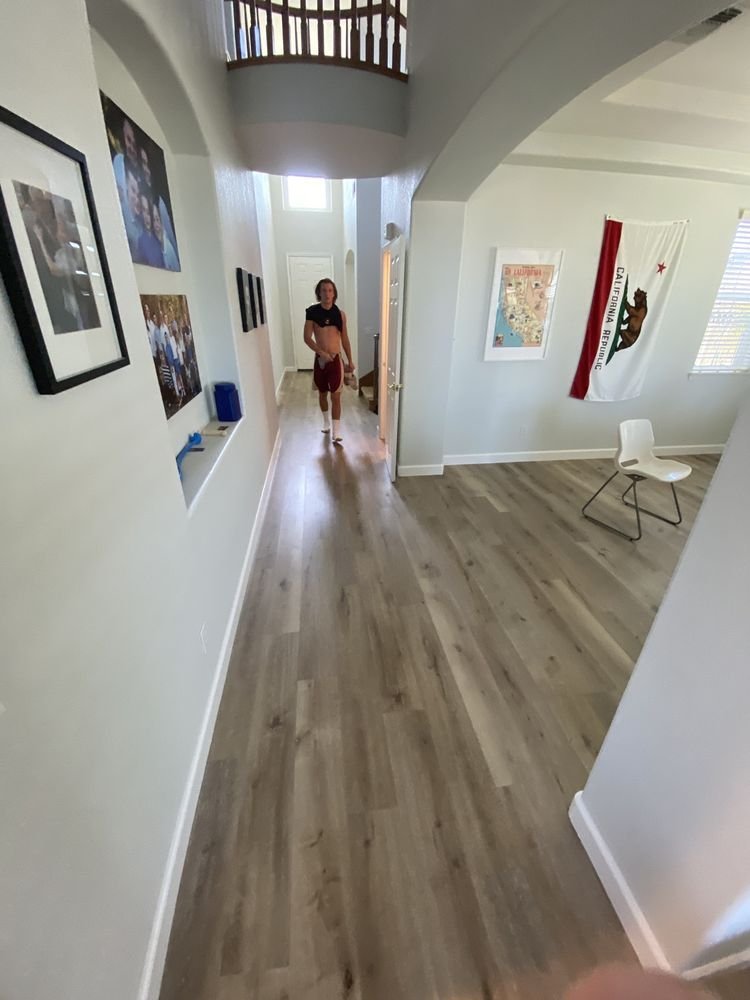 hallway with hardwood flooring