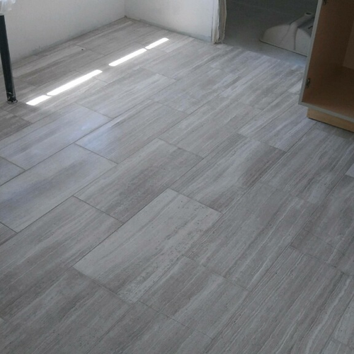 empty room with laminate flooring