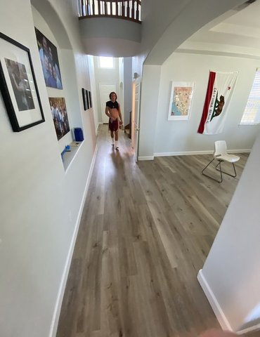 hallway with hardwood flooring