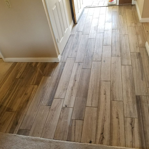 hallway with hardwood flooring
