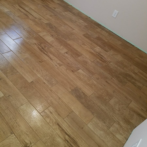 empty room with hardwood flooring