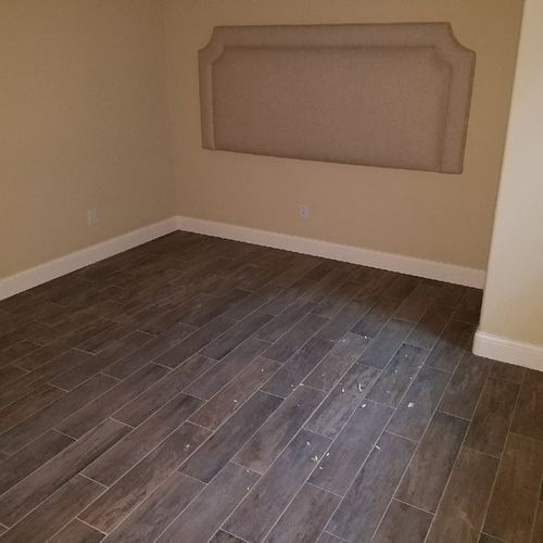 empty room with hardwood flooring