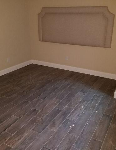 empty room with hardwood flooring