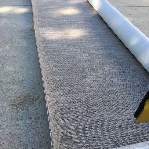 roll of carpet outside