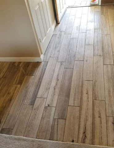 hallway with hardwood flooring