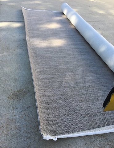 roll of carpet outside