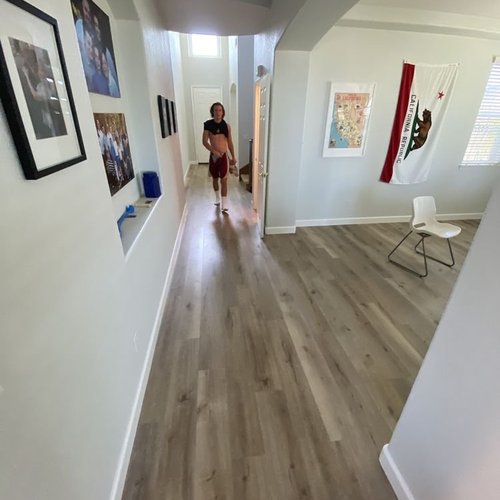 hallway with hardwood flooring